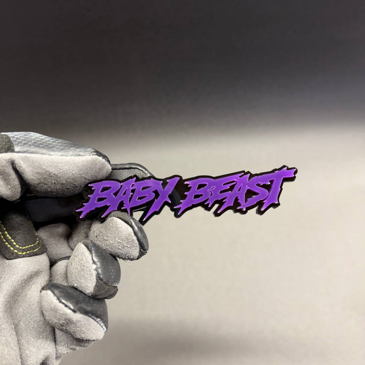 BABY BEAST custom automotive badge with purple lettering and black background for Toyota, Nissan, Ford, cars and trucks.