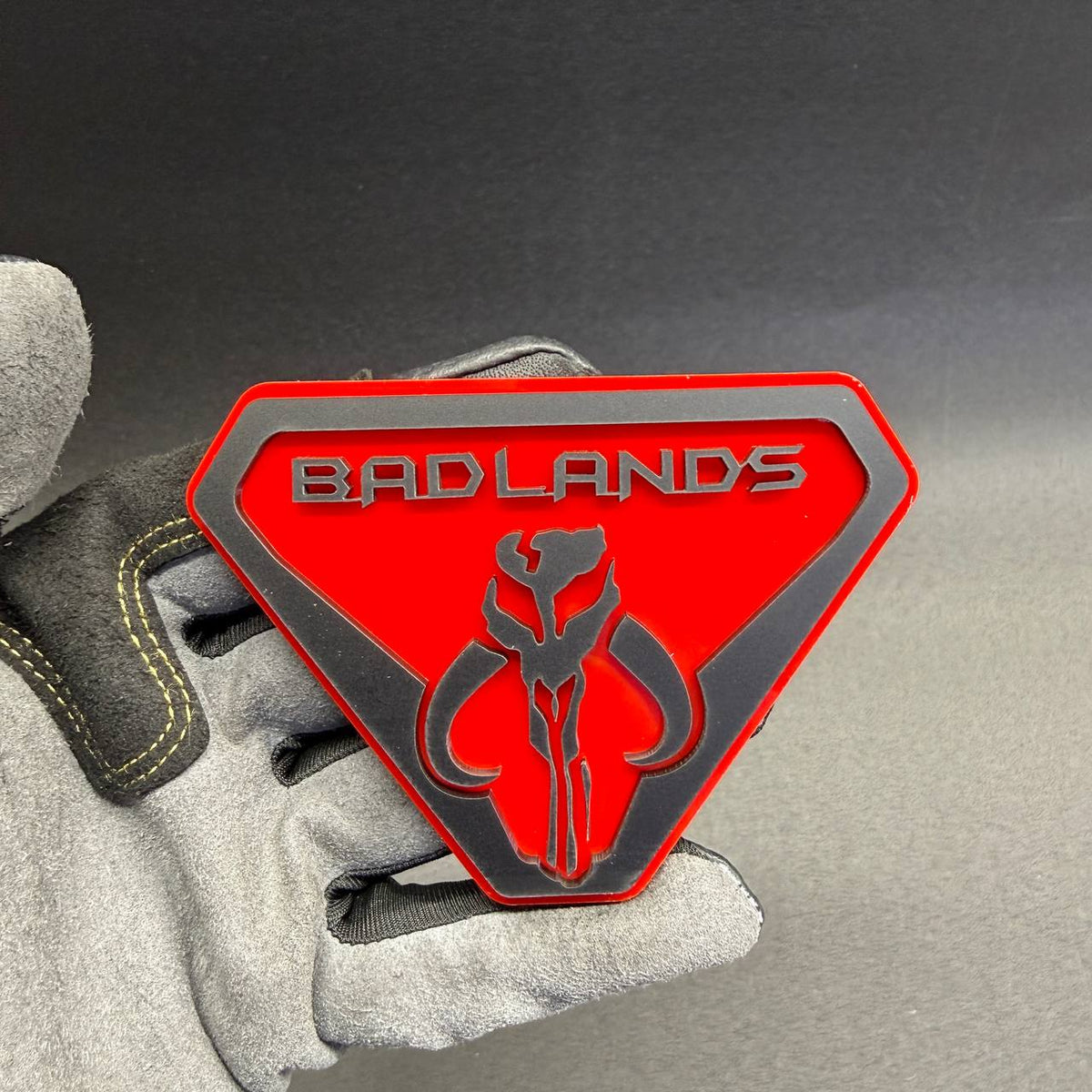 Badlands Mythosaur aftermarket automotive badge for Ford Bronco, Jeep Gladiator, Toyota Tacoma and other custom SUV or truck applications.