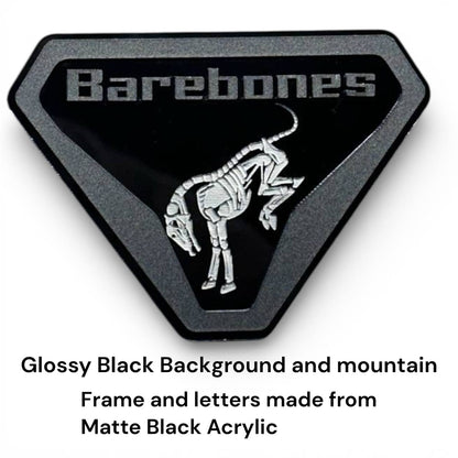Close up of Barebones skeleton emblem for Ford Bronco showing laser cut acrylic details