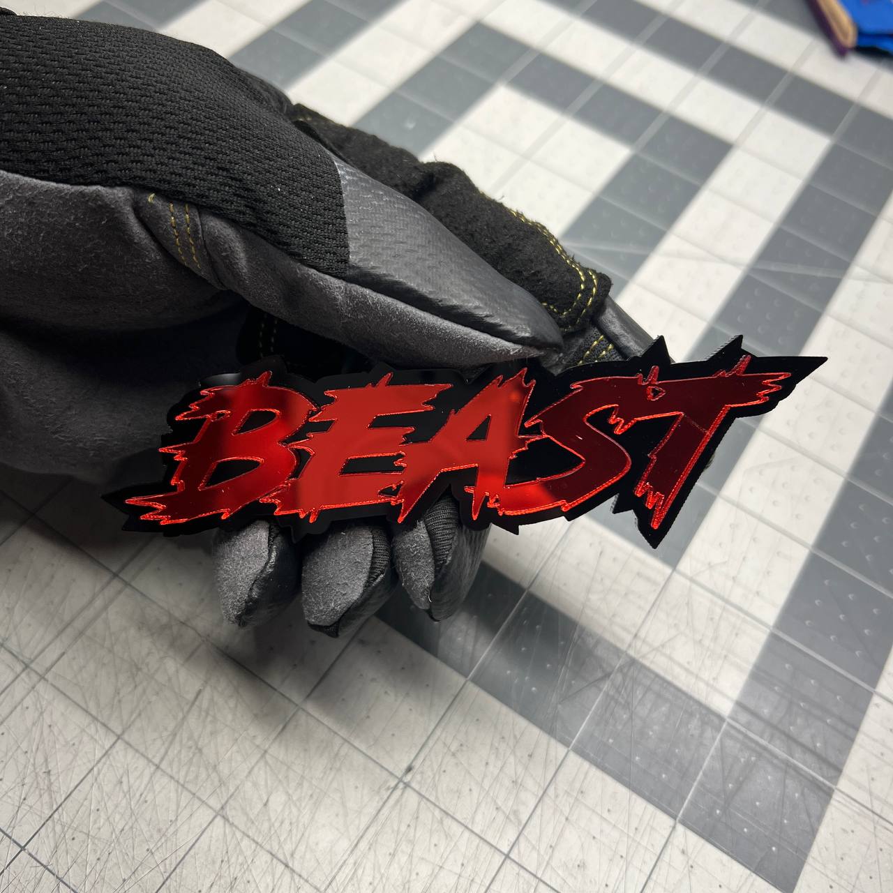 Custom BEAST text badge with aggressive performance style acrylic finish