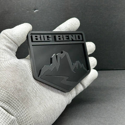 Mountain style acrylic badge installed on Ford Bronco tailgate with 3M tape