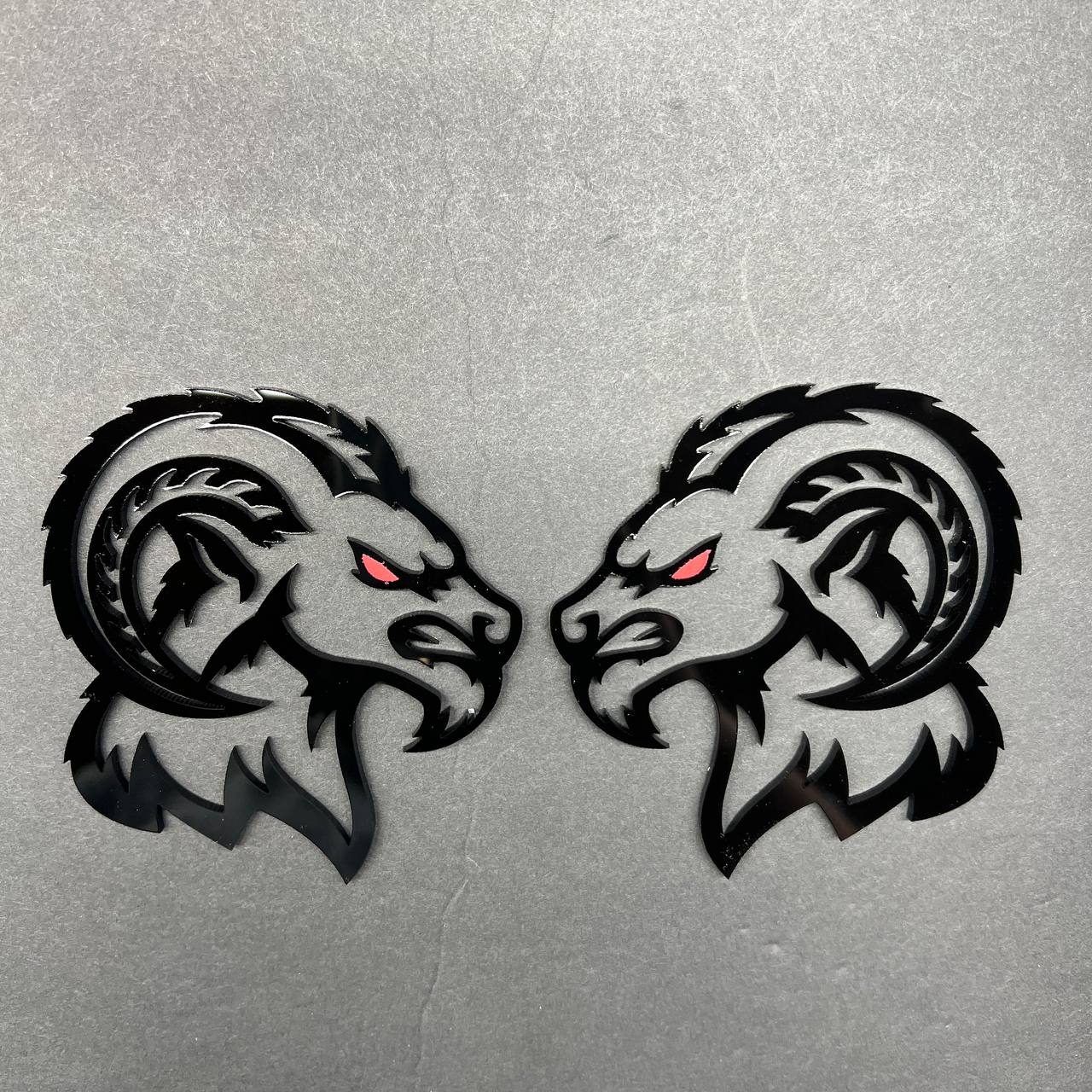 Custom Ram emblem pair with red eye for Ram 1500 2500 3500 trucks aftermarket badge