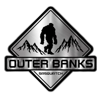 Big Sasquatch Outer Banks engraved car badge with brushed silver finish and mountain design