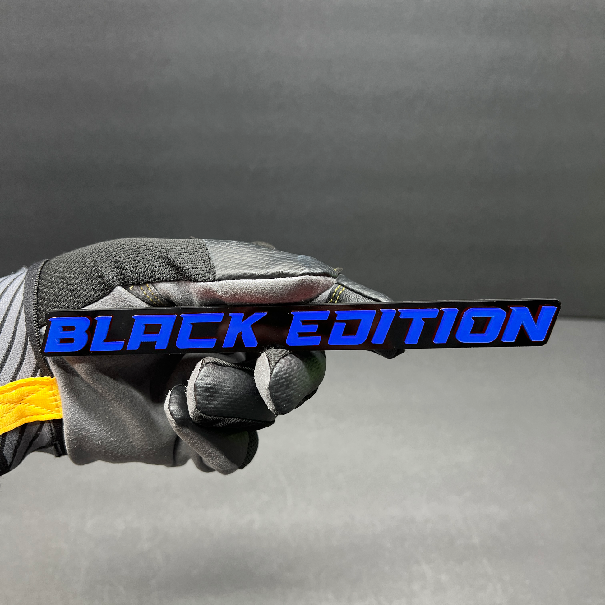 Black Edition custom automotive nameplate for personalized vehicle styling.