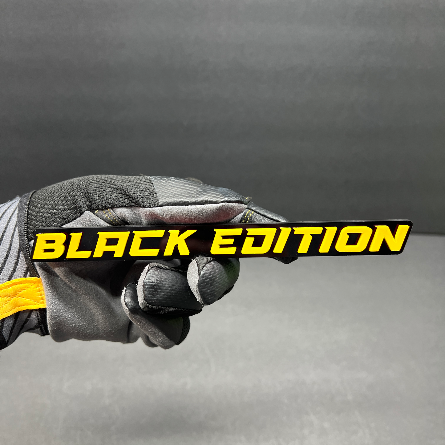 Black Edition automotive emblem for car fender, tailgate, or grille installation