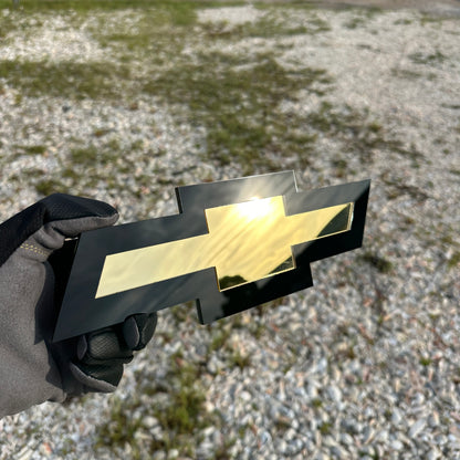 Chevrolet Bowtie badge with gold center and black border