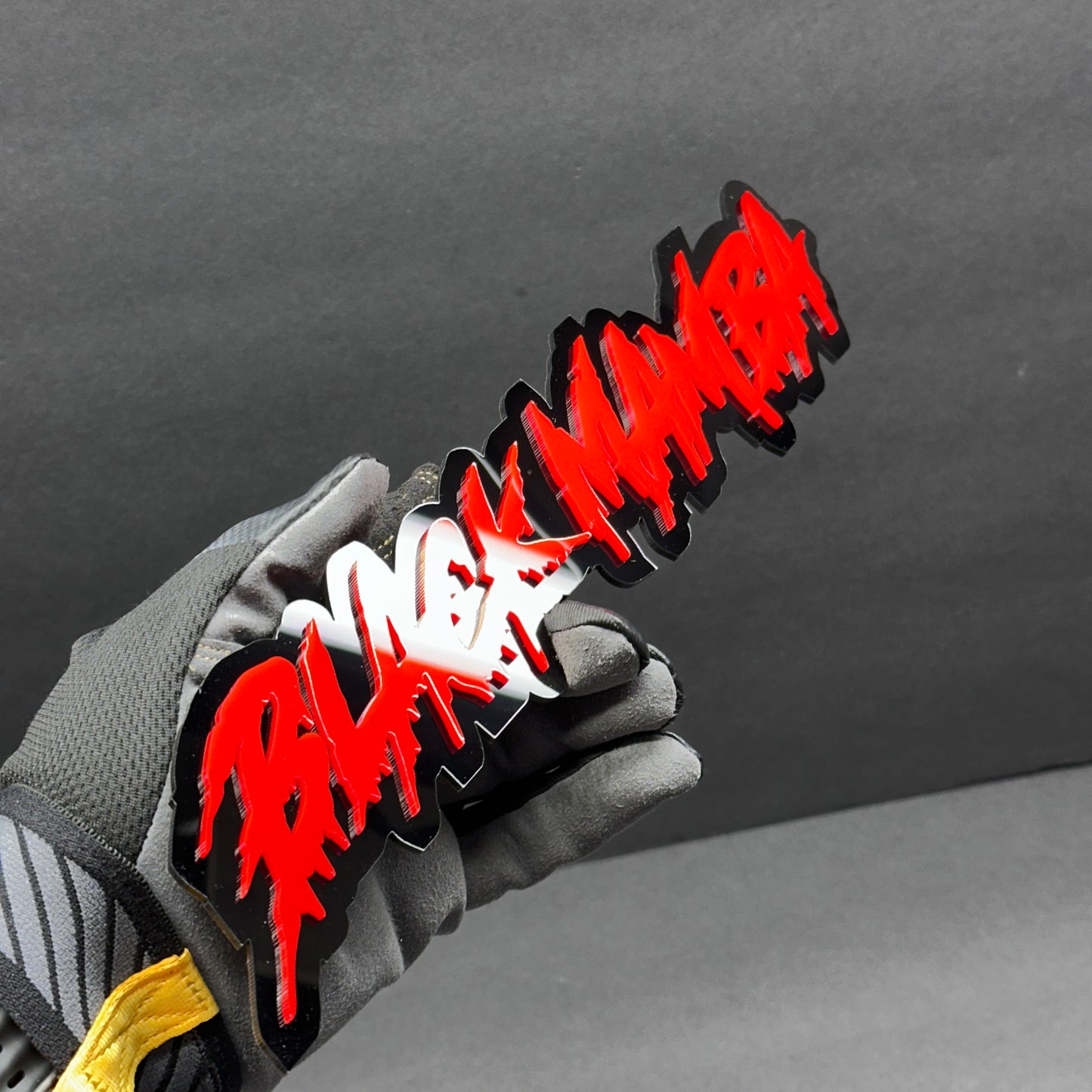Aggressive Black Mamba drip font badge with glossy black outline for RAM tailgate
