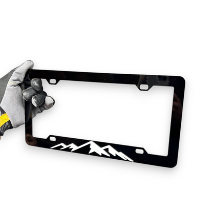 3D mountain themed license plate frame for SUV and overland builds