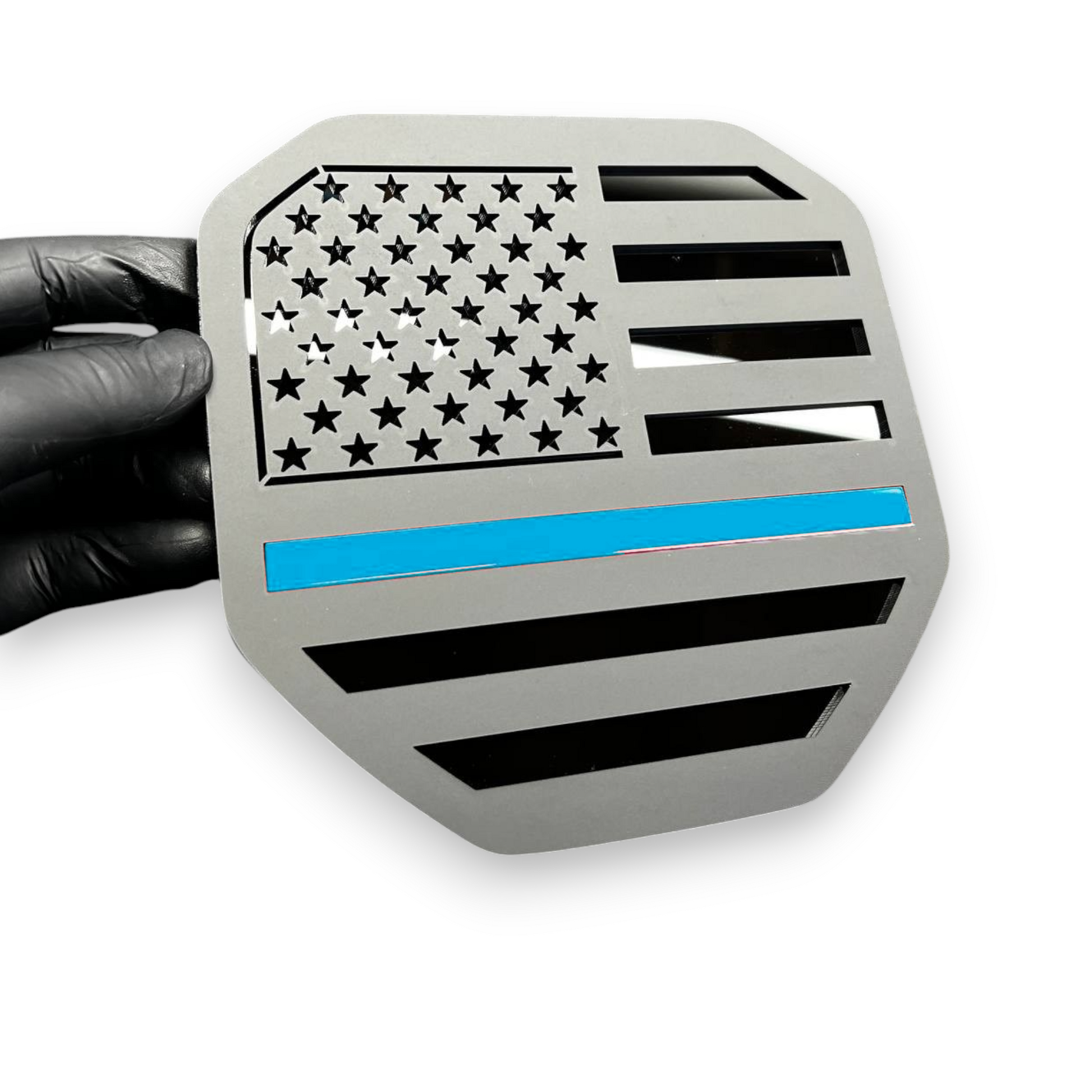 Black red line flag badge on Dodge Ram heavy duty truck styling