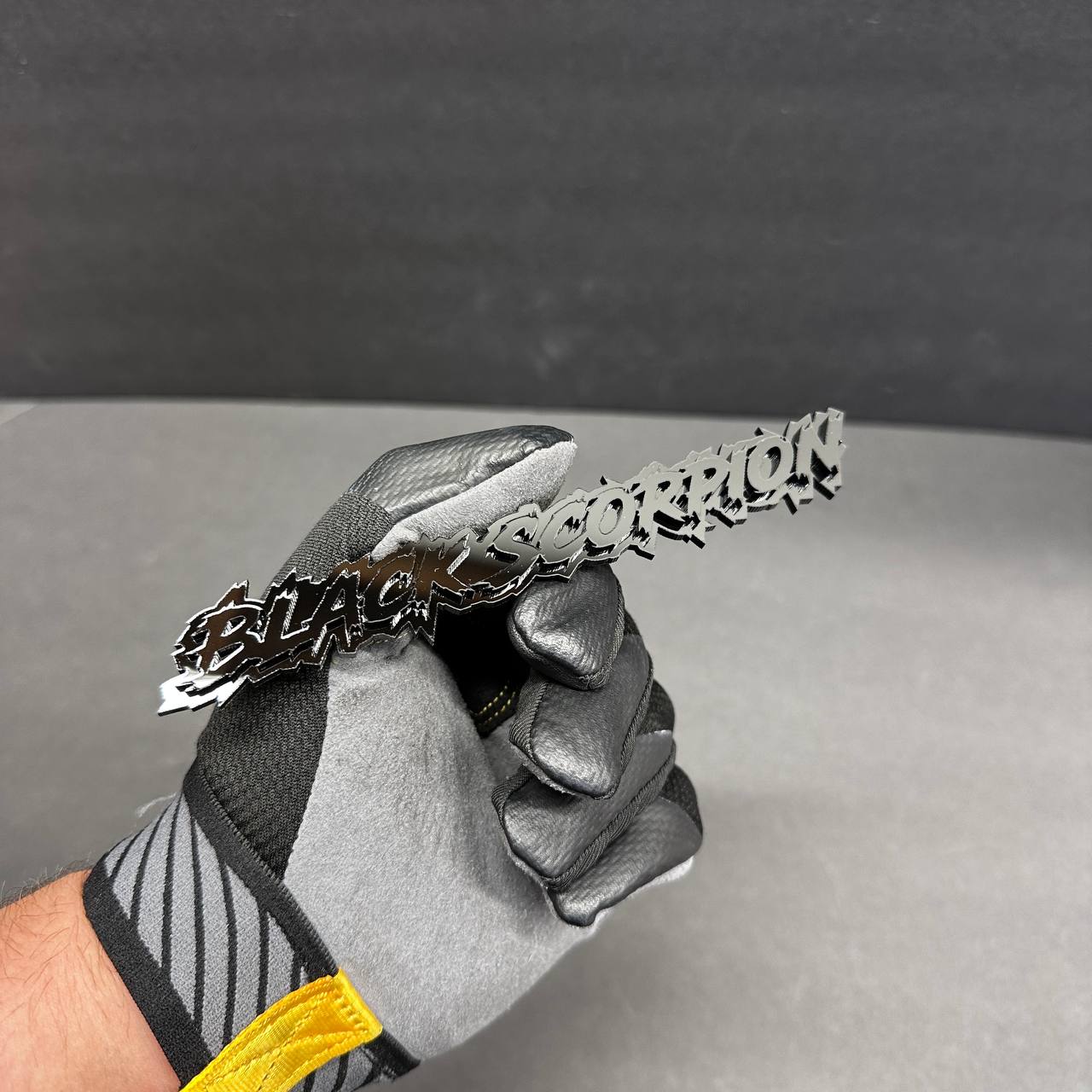Layered acrylic Black Scorpion text badge for offroad trucks and performance vehicles