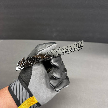 Layered acrylic Black Scorpion text badge for offroad trucks and performance vehicles