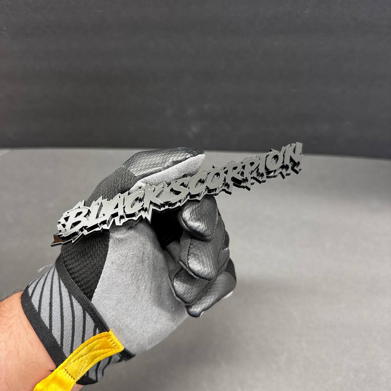 Black Scorpion custom car emblem with sharp racing inspired text style for automotive builds
