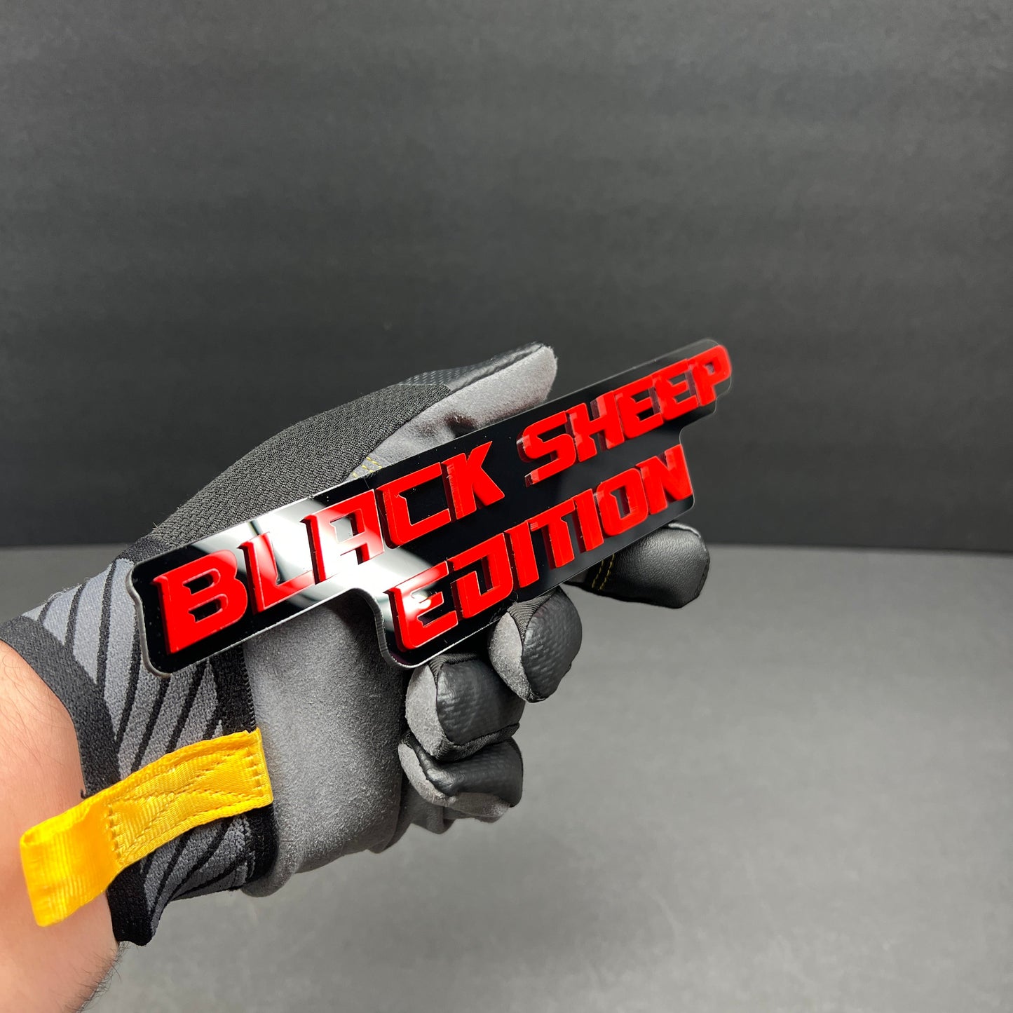 Red and black Black Sheep Edition emblem for trucks, SUVs, and cars.