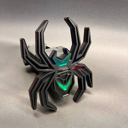Matte black and poison green Black Widow hitch receiver cover with layered spider design.