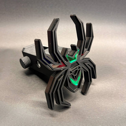 Custom spider hitch cover featuring a matte black finish and vivid green accent panels.