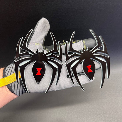 Black Widow spider car badge emblem with black body, silver outline, and red hourglass detail