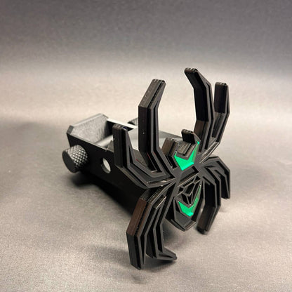 Black Widow car badge style hitch cover featuring matte black and bright green color contrast