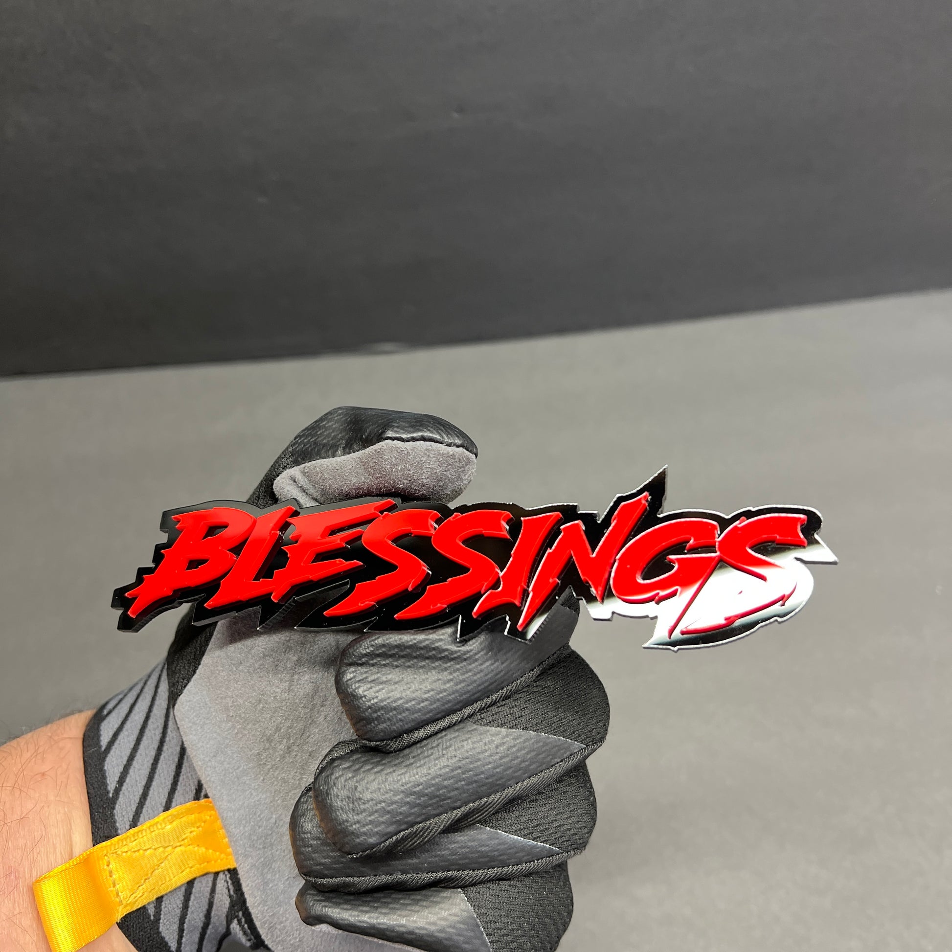 Glossy red Blessings automotive emblem for truck tailgate and side fender