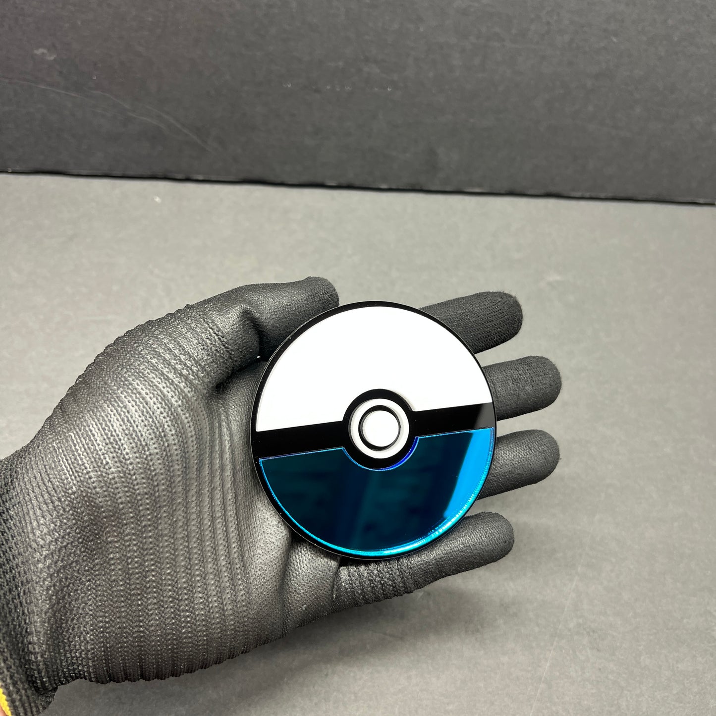Handmade monster ball inspired auto badge accessory for cars and trucks