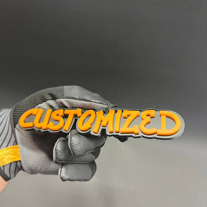 Custom text badge in graffiti style with orange and black design.