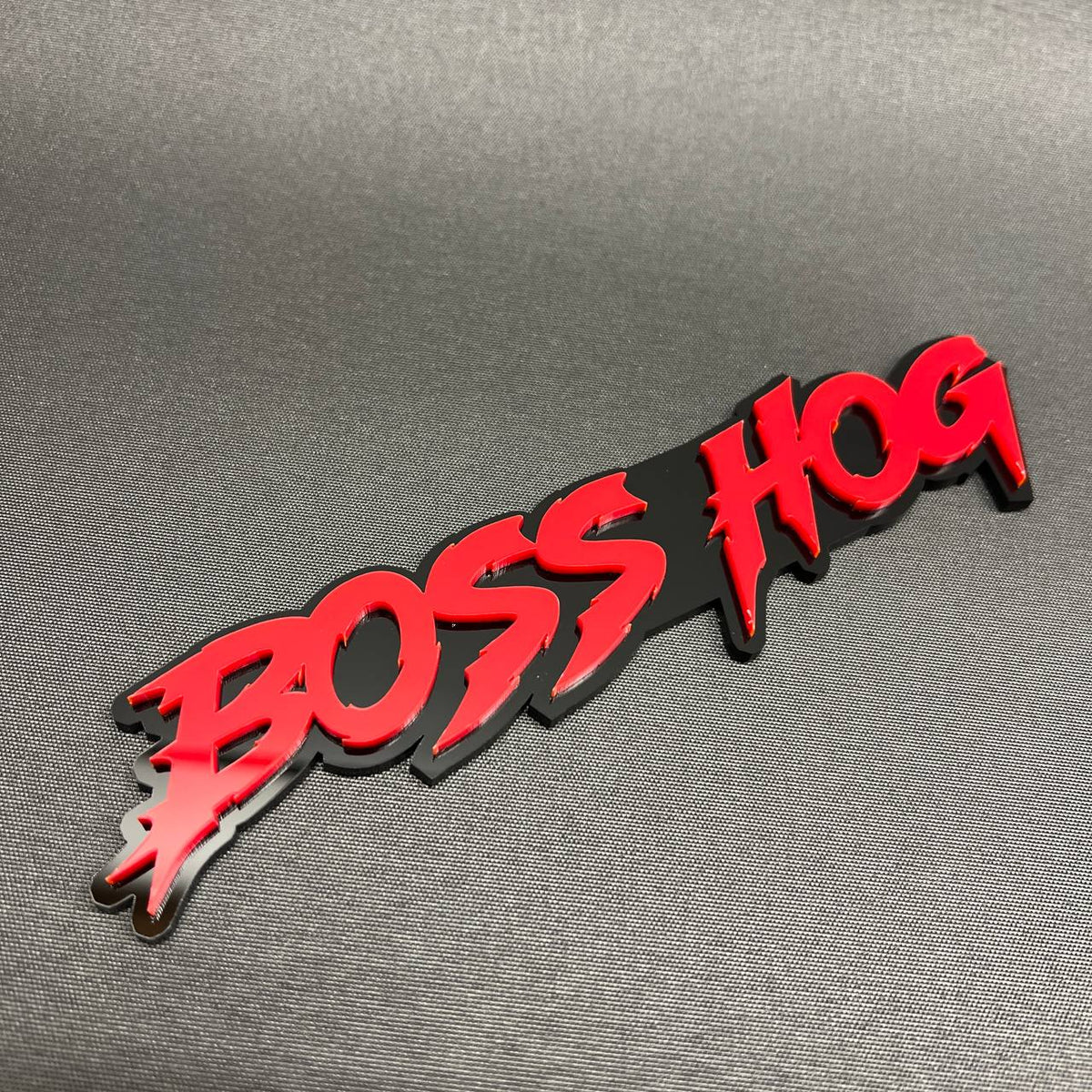 Boss Hog automotive emblem red on black custom exterior car badge