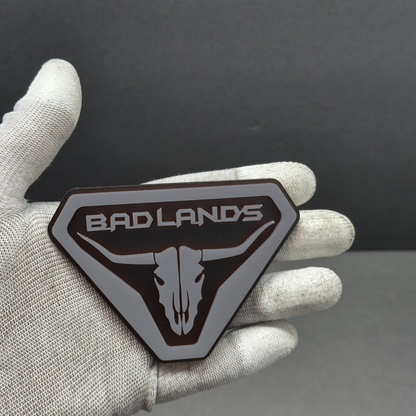 Gray 3D acrylic Bronco Badlands skull badge emblem – adhesive fender emblem, UV and scratch resistant.