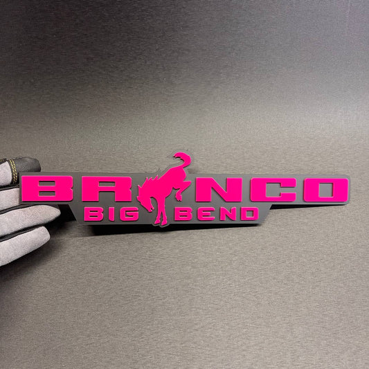 Bronco Big Bend car badge fender emblem with pink lettering on gray base