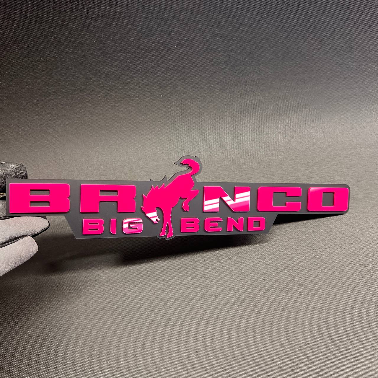 Bronco Big Bend aftermarket badge with raised pink text and gray background