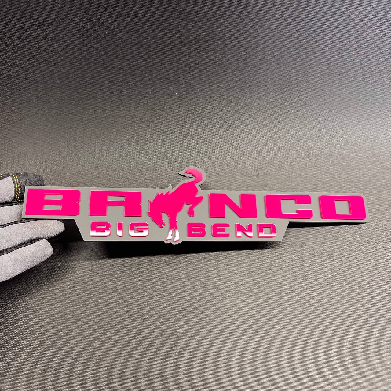 Bronco Big Bend truck badge with pink letters and gray layered design
