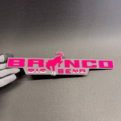 Bronco Big Bend truck badge with pink letters and gray layered design