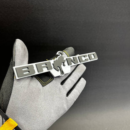 White and gray Bronco tailgate badge for exterior vehicle upgrade