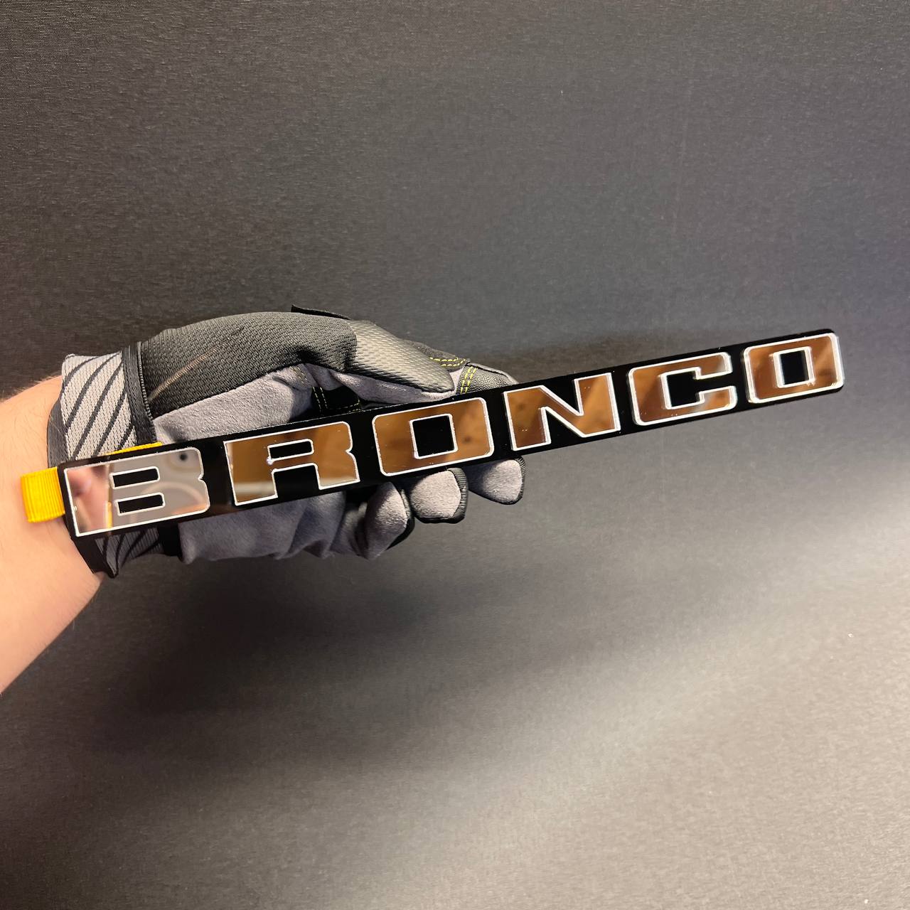 Gloss black and silver BRONCO badge with automotive adhesive backing
