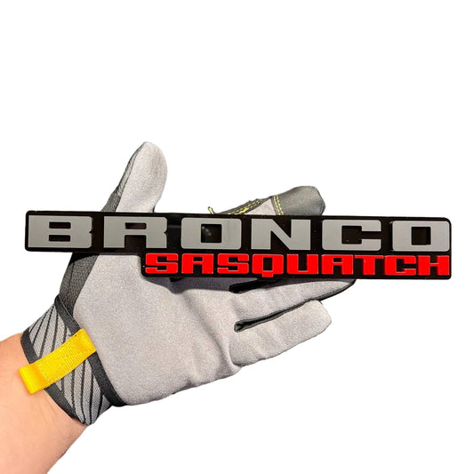 BRONCO SASQUATCH car badge fender emblem in red and silver on black backing