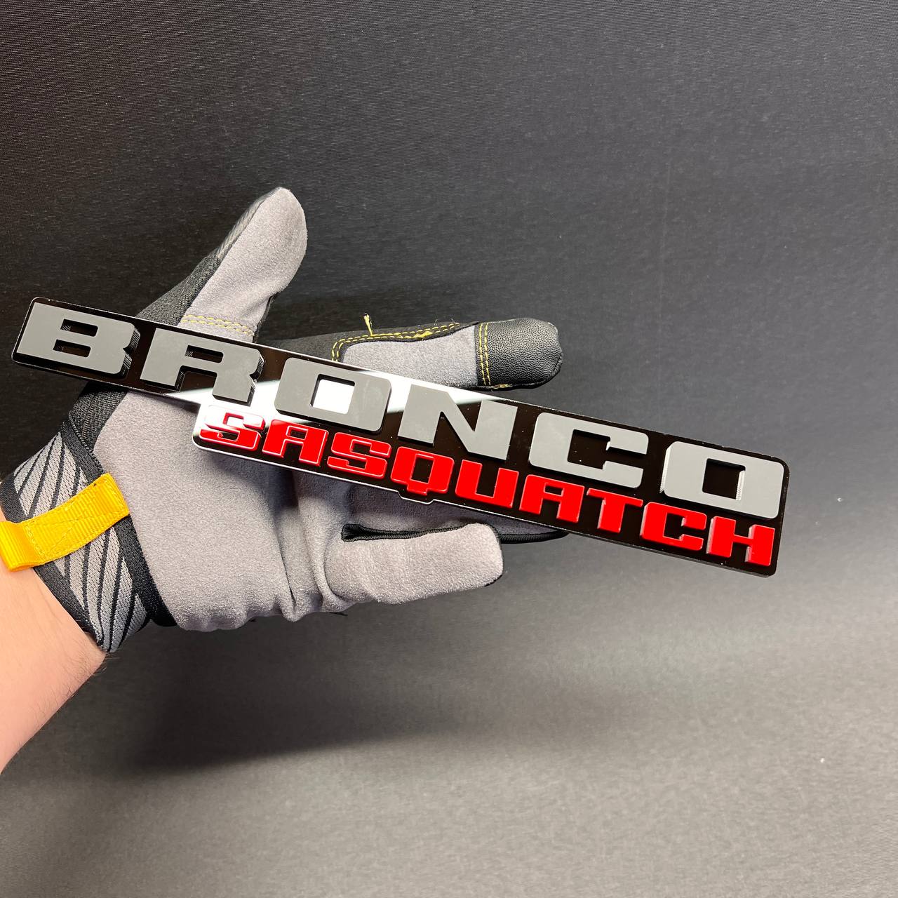 BRONCO SASQUATCH fender emblem badge with black base and 3M adhesive backing