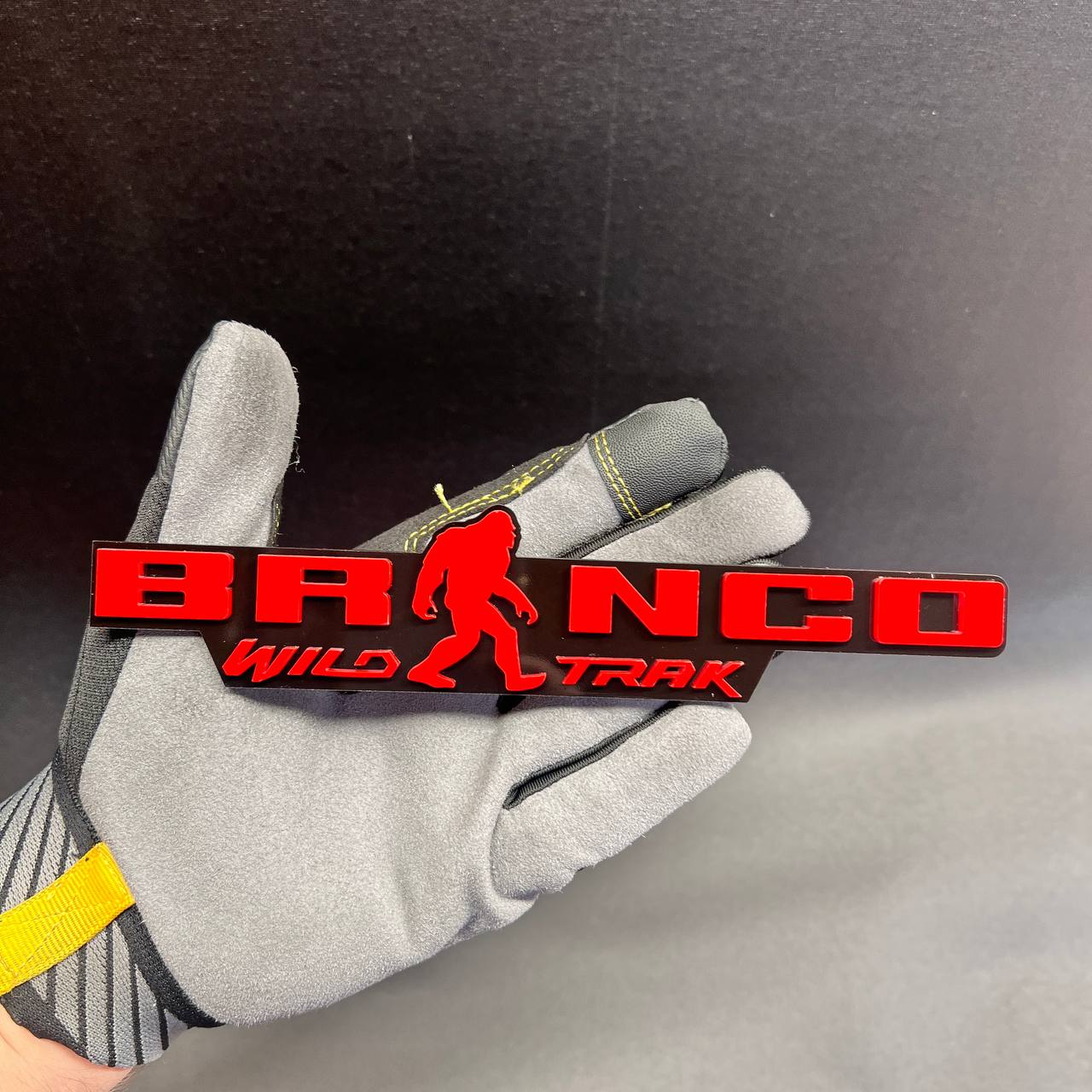 Red and black Bronco Sasquatch Wildtrak exterior car emblem