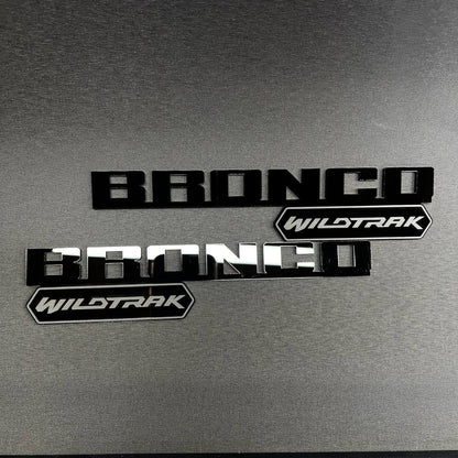 Bronco Wildtrak car badge fender emblem in black and silver finish