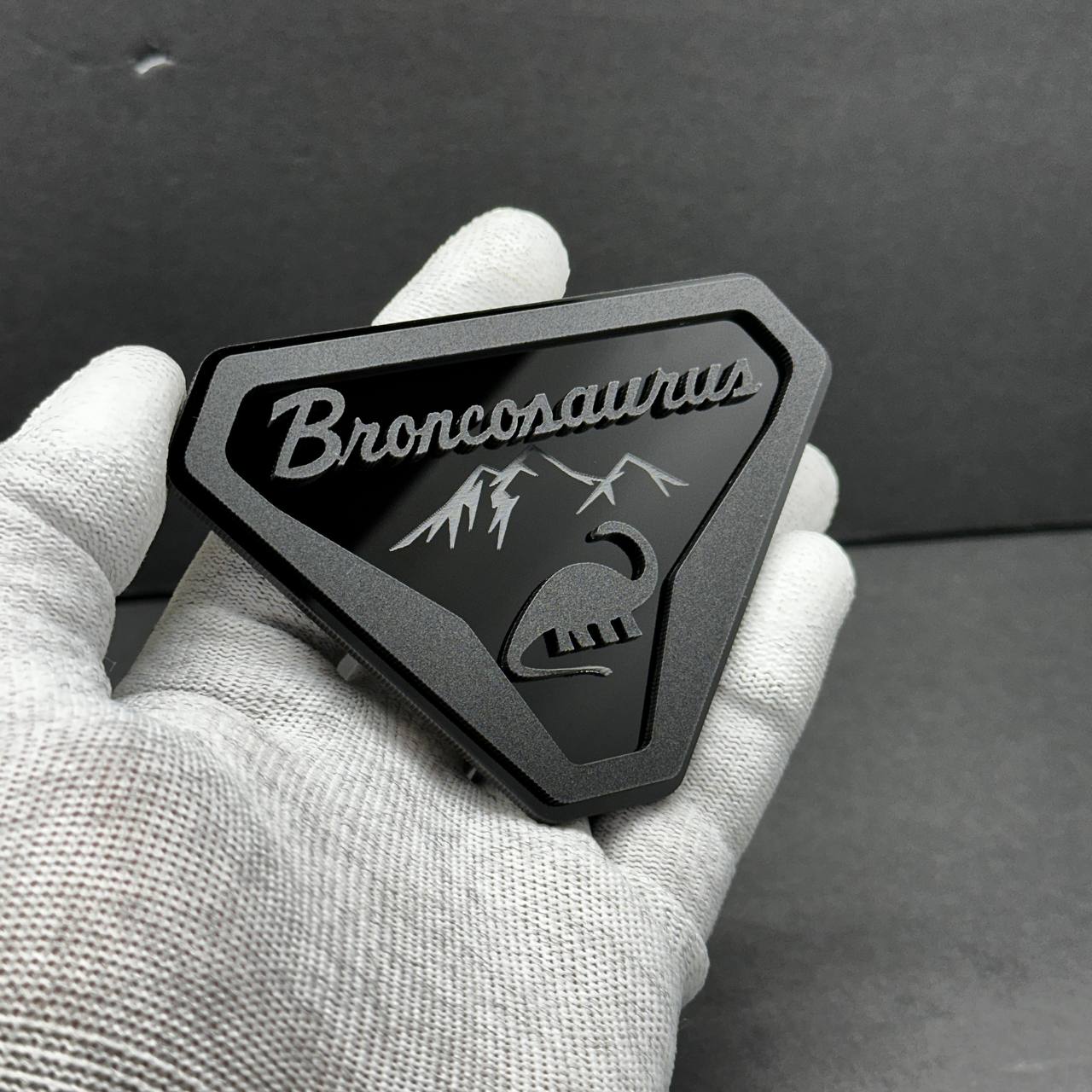 Broncosaurus emblem for Ford Bronco tailgate or grille using automotive-grade acrylic material