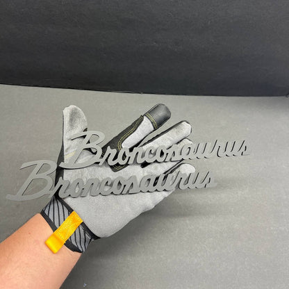 Matte black Broncosaurus exterior decal badge for cars and trucks