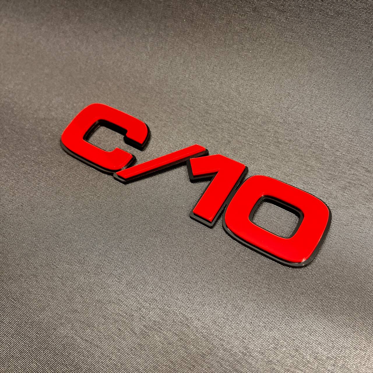 Chevrolet C/10 custom fender emblem badge in multicolor billet look finish.