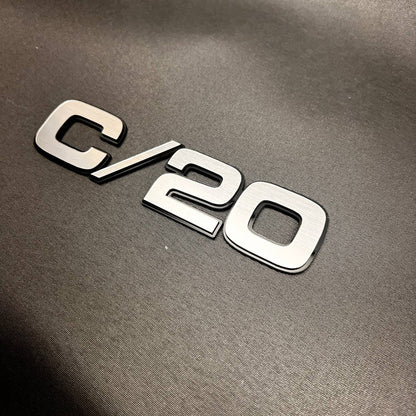 Chevy GMC C/20 truck exterior badge with brushed silver billet front finish