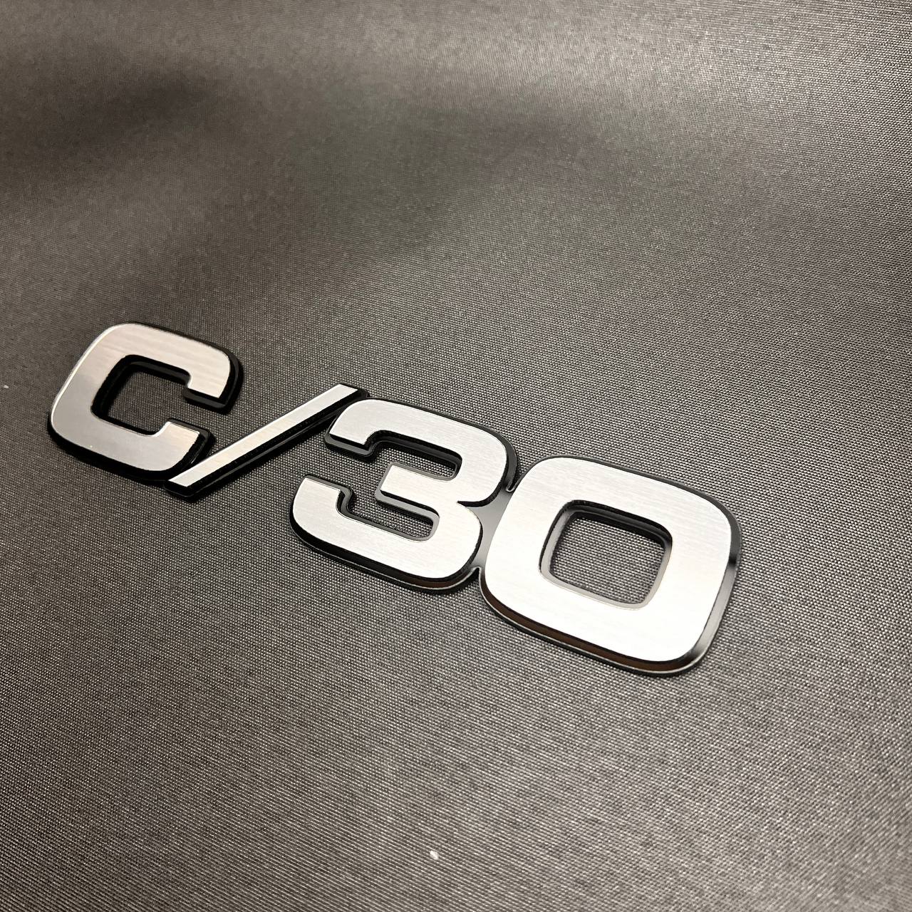 Chevy C/30 truck fender badge with brushed billet look and black outline
