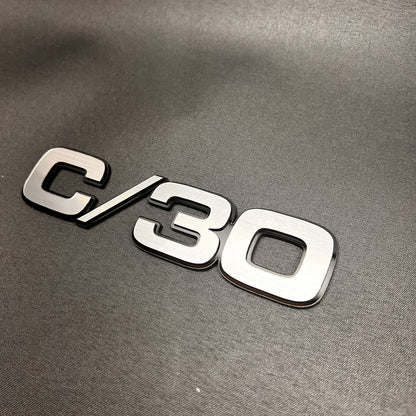 Chevy C/30 truck fender badge with brushed billet look and black outline
