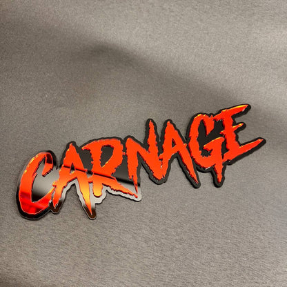CARNAGE automotive text badge made from layered red and black acrylic