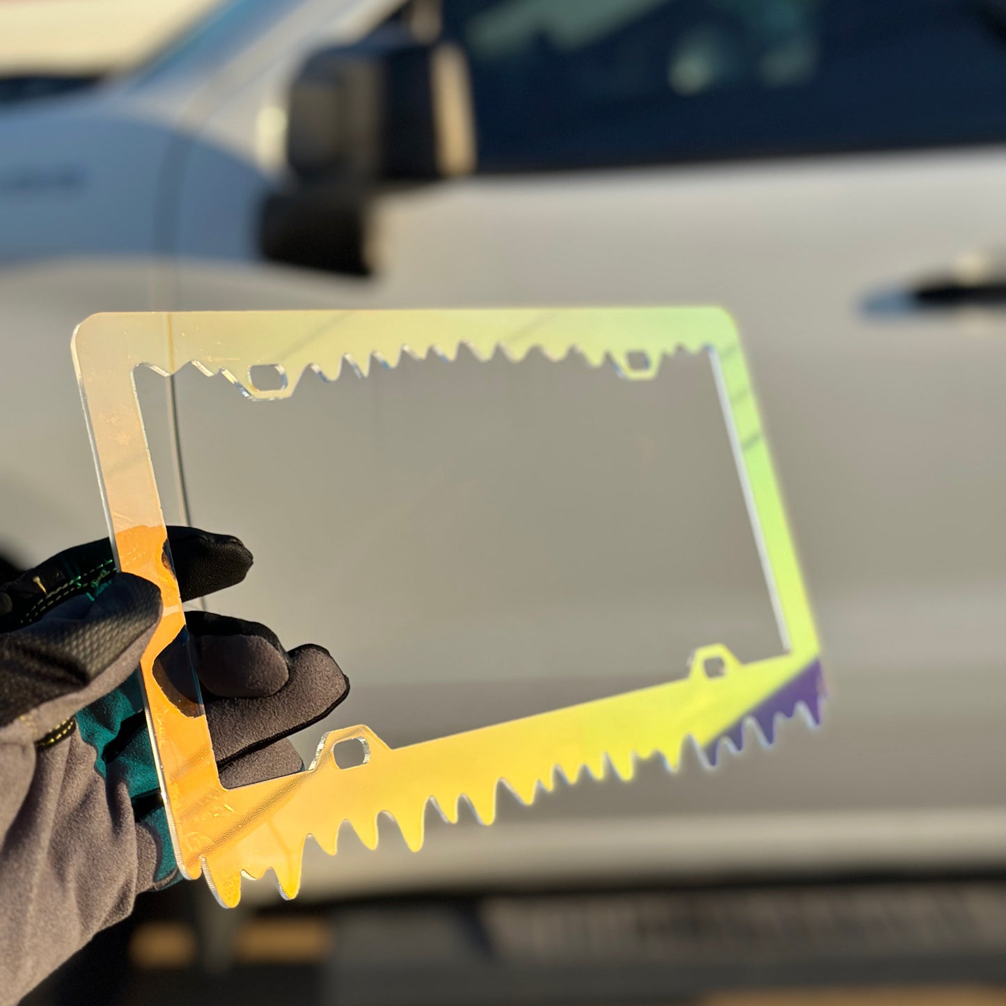 Slime drip license plate frame with iridescent color changing finish