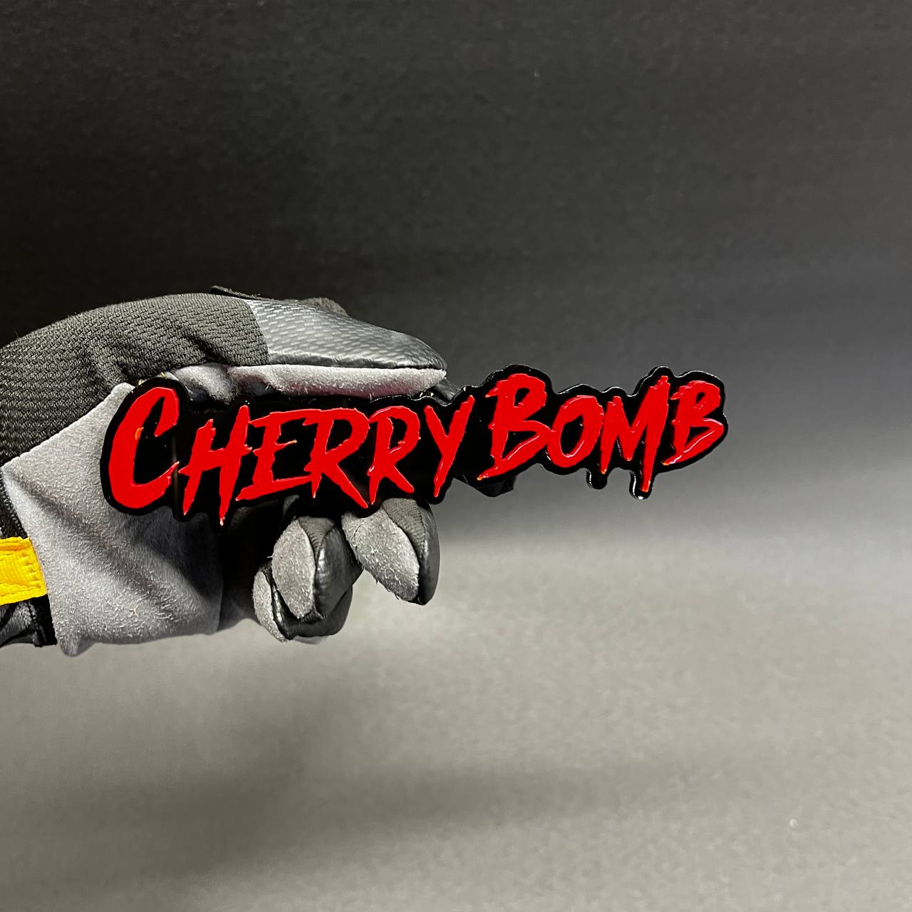 Cherry Bomb tuner car emblem in graffiti drip lettering style