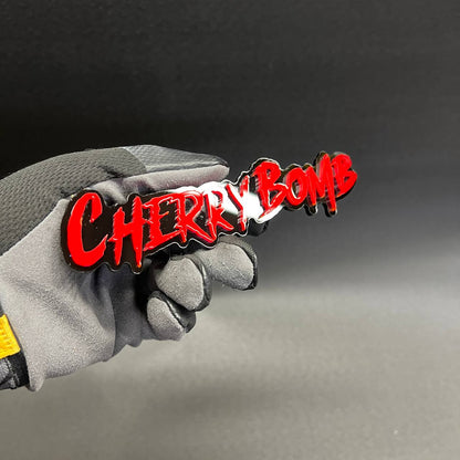 Custom Cherry Bomb JDM style car badge with black outline acrylic