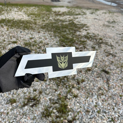 Chevrolet Bowtie silver emblem with centered glow Decepticon graphic