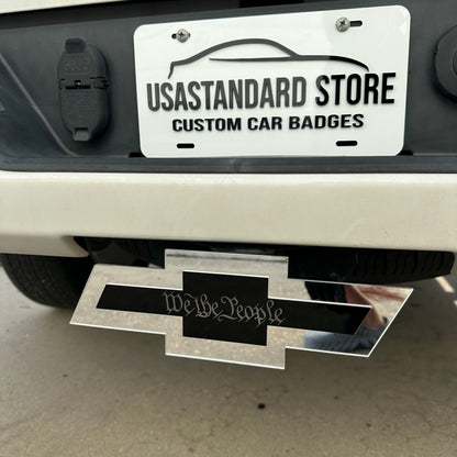 Chevrolet Bowtie hitch emblem featuring We the People text on black center