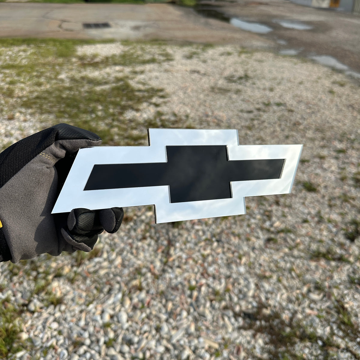 Chevy Bowtie car badge in silver and black finish