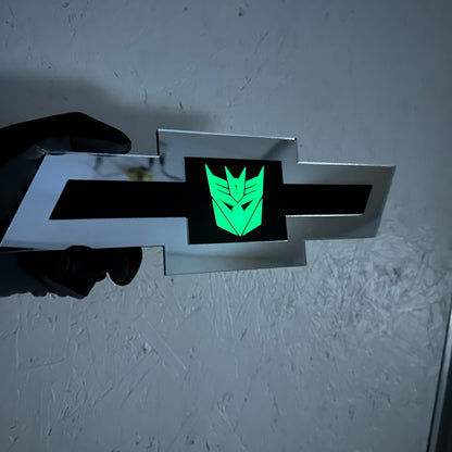 Chevrolet car badge in silver with Decepticon glow center design